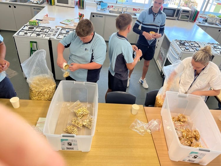 Students prepare food for selling